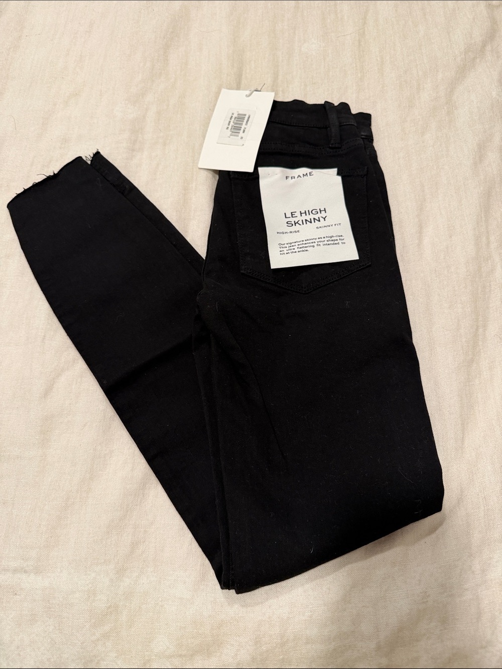 Frame le high skinny black jean
